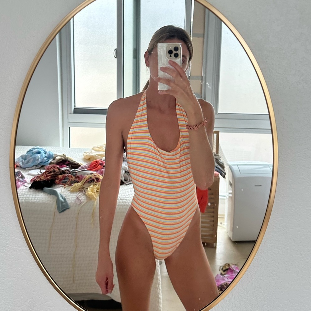 super cute open back one piece